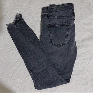 Black high rise ripped skinny jeans w/ frayed ends